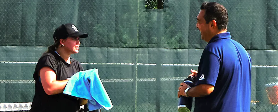 Coach and Athlete at College Tennis Exposure Camp